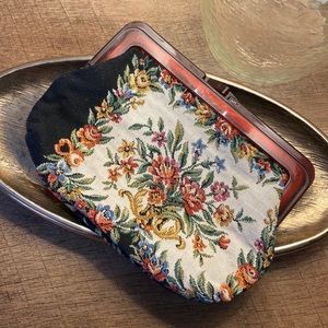 Small clutch/coin purse with brown clasp opening